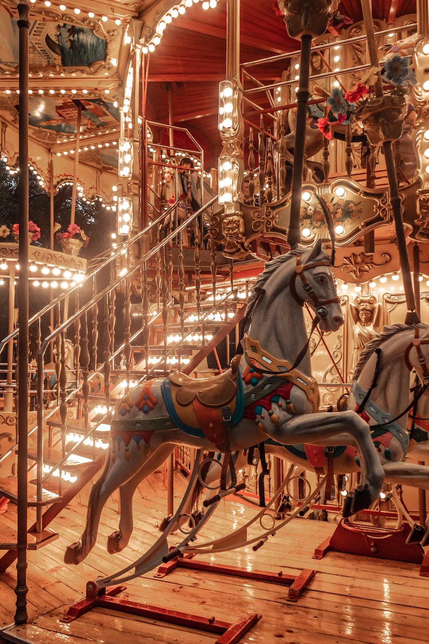 illuminated carousel with horse in run